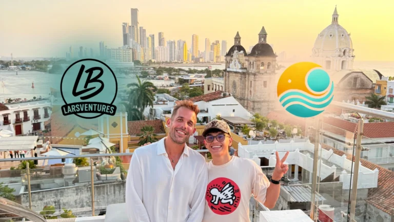 Lars and Sebas smiling on a rooftop in Cartagena at sunset with the skyline and cathedral in the background, featuring LarsVentures and Two Worlds Unite logos.