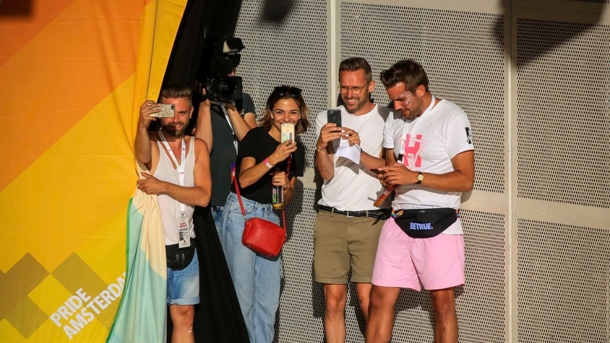 Lars with the Pride Amsterdam team during the event, celebrating love, community, and the spirit of connection.