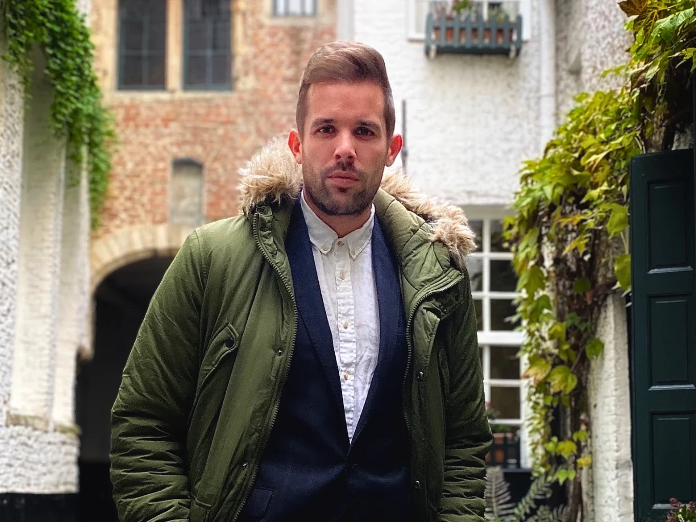 Lars Brunnhoff, private residence operator for luxury homes, portrait in a European courtyard.